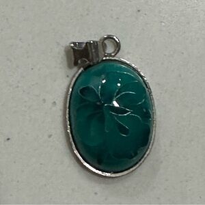 Necklace pendant turquoise stone with floral design set in sterling silver
